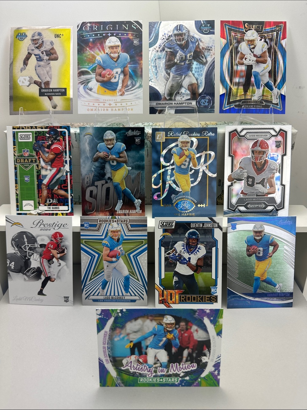 12 rookie cards of Chargers Omarion Hampton/Johnston/McConkey/Harris/Vidal